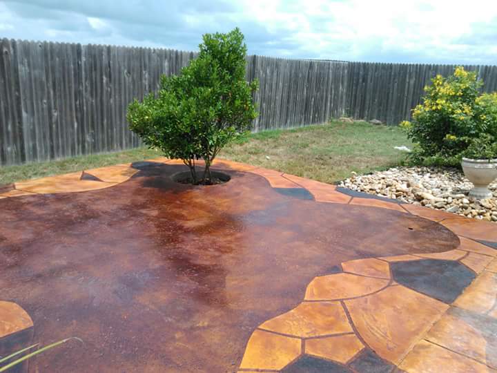 Brown concrete tiles with tree and falls on the back